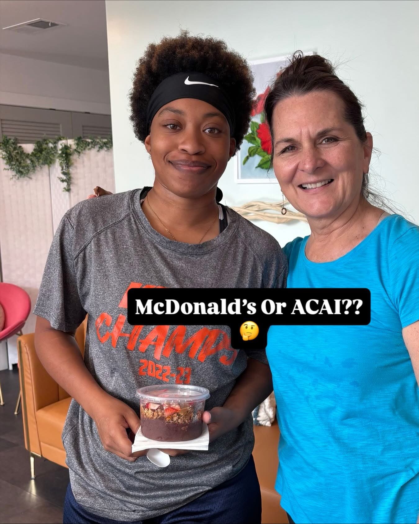 Two guests holding an acai bowl with the caption McDonald's or acai?